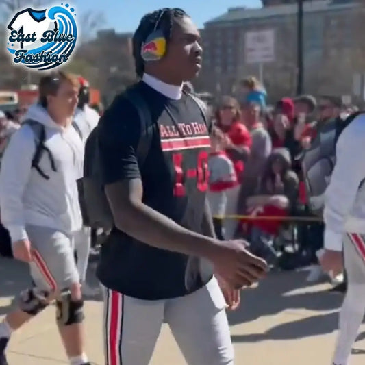 Several Buckeyes players attended the Shoe event wearing shirts that read “All to Him IO” as a statement
